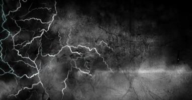 Lightning strikes and dark background photo