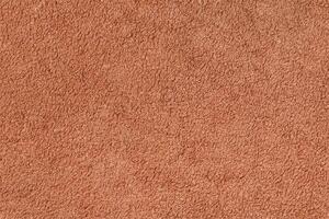 Smooth seamless texture of a terry towel. Sand color photo