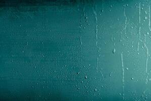 Abstract turquoise background with microscopic air bubbles. Bubbles background in aqua blue. photo
