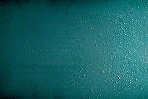 Abstract turquoise background with microscopic air bubbles. Bubbles background in aqua blue. photo