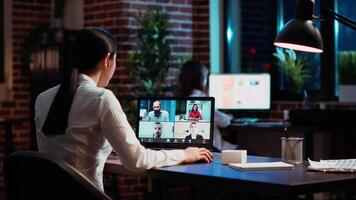 Staff member discussing with members of board of directors during company meeting on videocall. Worker talking in corporate remote videoconference telework call, presenting ideas video