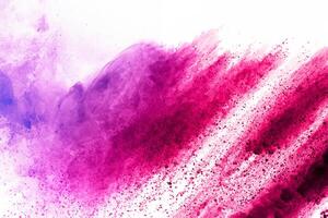 abstract powder splatted background. Colorful powder explosion on white background. Colored cloud. Colorful dust explode. Paint Holi. photo