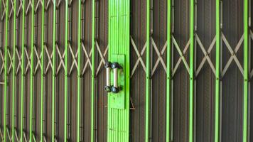 The shop gate is green photo