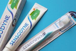 KYIV, UKRAINE - MAY 4, 2022 Sensodyne fluorine or fluor is a daily fluoride toothpaste photo