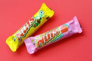 KYIV, UKRAINE - MAY 4, 2022 Nuts original chocolate bar manufactured by Nestle company photo