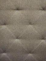 Upholstery fabric. Sofa upholstery made of rough fabric. Vintage fabric background photo
