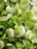 Green onions. Chopped green onions. Chopped onions for salad photo