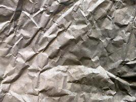 Crumpled paper. Crumpled light parchment. Vintage crumpled paper background photo