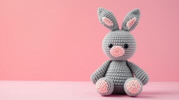 AI generated Crocheted rabbit toy vibrant backdrop, handcrafted and adorable, Ai Generated photo