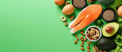 AI generated Concept of a ketogenic diet with ingredients like salmon, avocado, eggs, nuts, and seeds, set against a bright green backdrop, top perspective, Ai Generated. photo