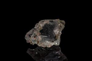 macro mineral stone Topaz on a black background photo