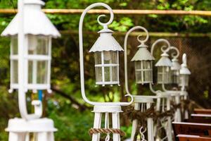 Beautiful white lanterns lined up in a row photo