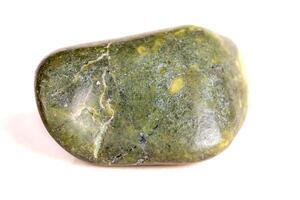 Macro mineral stone jasper on a white background photo