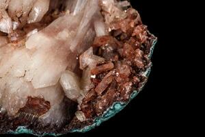 Macro of a stone Albite mineral on a black background photo