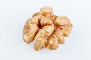 macro juglandaceae nuts, walnut on a white background photo