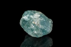 macro mineral stone aquamarine on a black background photo