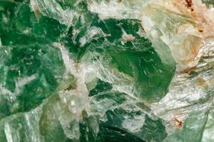 Macro stone mineral Fluorite on a black background photo