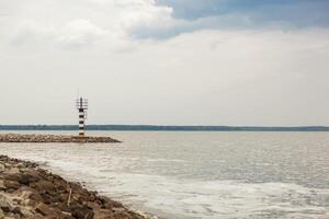 Beautiful view of the sea with borders and view of the lighthouse photo