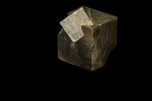 Macro mineral stone Pyrite on a black background photo