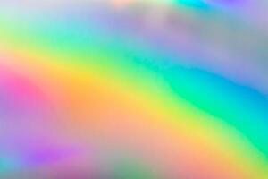 fondo iridiscente de lámina de arco iris holográfico de desenfoque abstracto foto