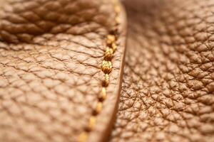 lujo marrón cuero bolso textura antecedentes con puntadas foto