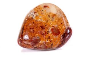 Macro mineral stone jasper on a white background photo