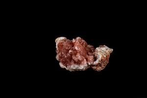Macro mineral stone Pink Amethyst on a black background photo