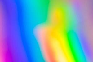 Abstract blur holographic rainbow foil iridescent background photo