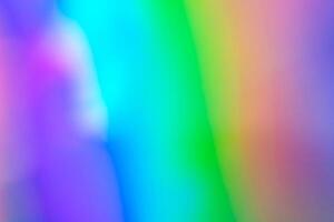 Abstract blur holographic rainbow foil iridescent background photo