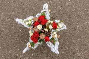 Christmas composition of flowers and Christmas decorations photo