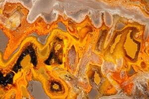 Macro mineral stone Bee jasper on a gray background photo