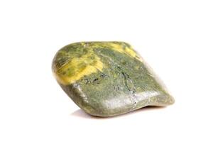 Macro mineral stone jasper on a white background photo