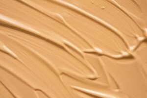 liquid foundation makeup cream texture background photo