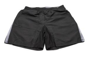 Black sports shorts isolated with white background. Concept of comfortable clothing. photo