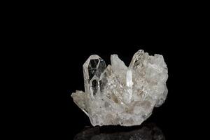 Macro mineral stone rhinestone, rock crystal on a black background photo