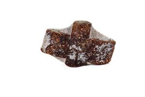 macro mineral stone Staurolite on a white background photo