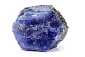 Macro blue tourmaline mineral stone on white background photo