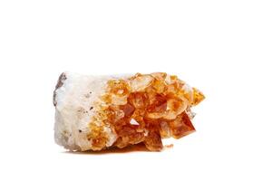 Macro mineral stone Citrine in rock in crystals on a white background photo