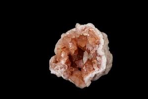 Macro mineral stone Pink Amethyst on a black background photo