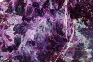 macro mineral stone Charoite on a white background photo