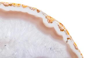 Macro mineral orange agate in crystals on white background photo