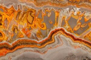 Macro mineral stone Bee jasper on a gray background photo