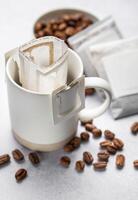 A  cup of freshly brewed drip coffee photo