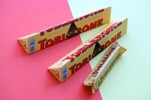 KYIV, UKRAINE - OCTOBER 31, 2023 Yellow Toblerone Chocolate Bar. Toblerone originated in Switzerland around 1908 photo