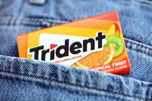 KYIV, UKRAINE - NOVEMBER 27, 2023 Trident chewing gum pack. Trident is famous US chewing gum brand photo