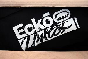 KYIV, UKRAINE - 4 MAY, 2023 Ecko Unltd company logo on new brand clothes photo