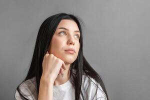 Portrait of a thoughtful young girl. photo