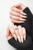 Manicured nails with pearlescent nail polish photo