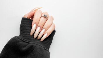Manicured nails with pearlescent nail polish photo
