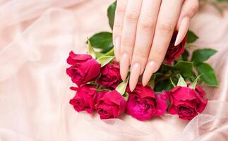 Elegant pastel pink natural manicure. photo